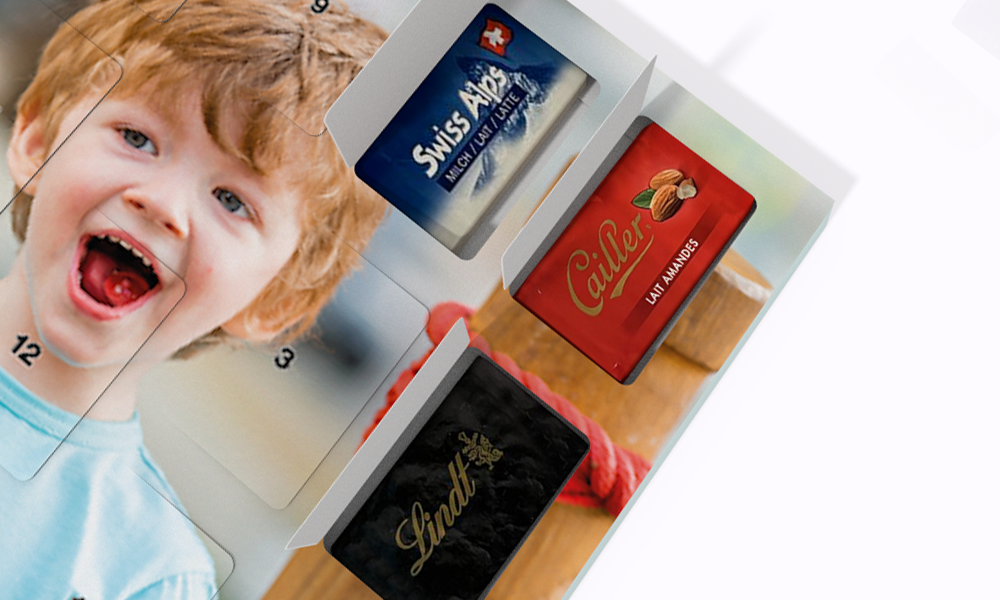 Bestelle deinen Adventskalender mit feinster Cailler-Schokolade oder mit anderen Marken wie Lindt oder Alprose.